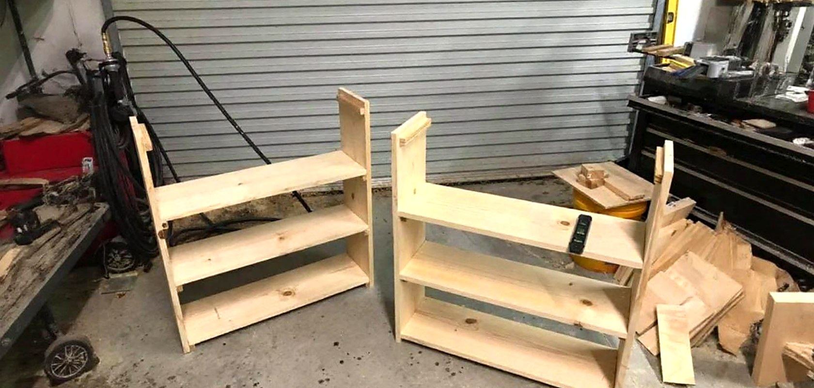 Two pine shelf units under construction in the shop