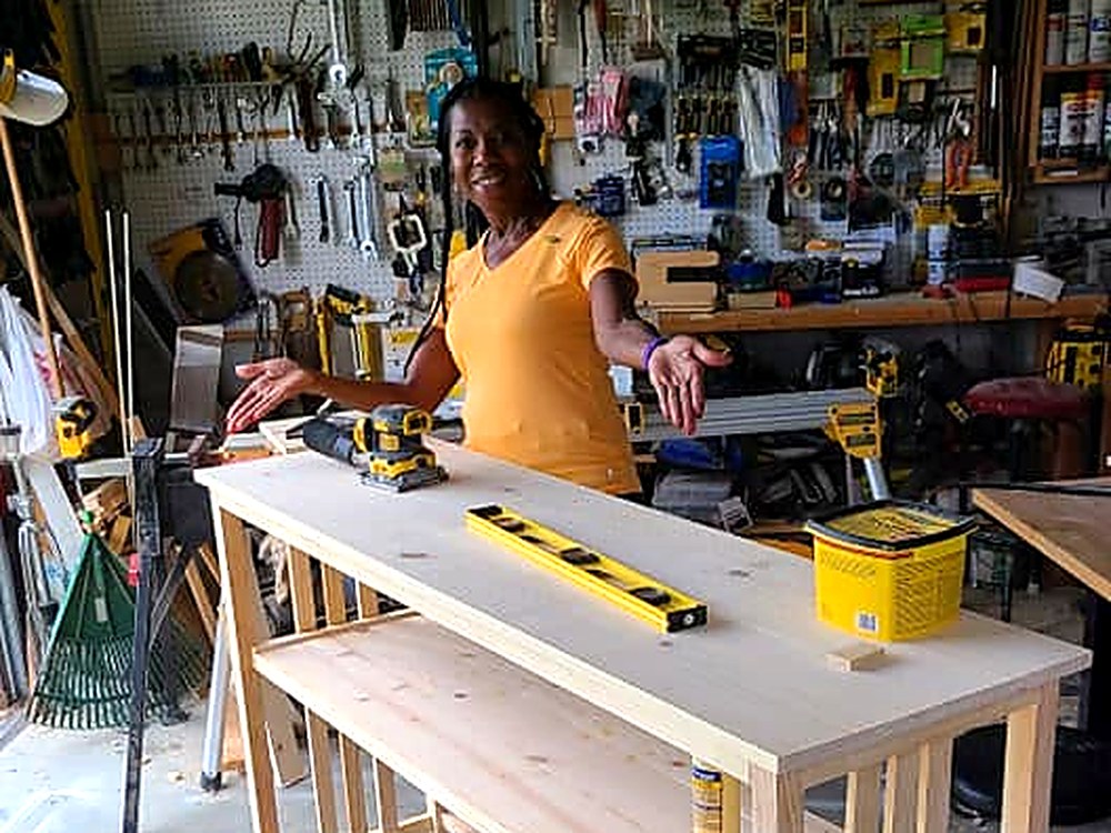 Sanding a console table in the shop
